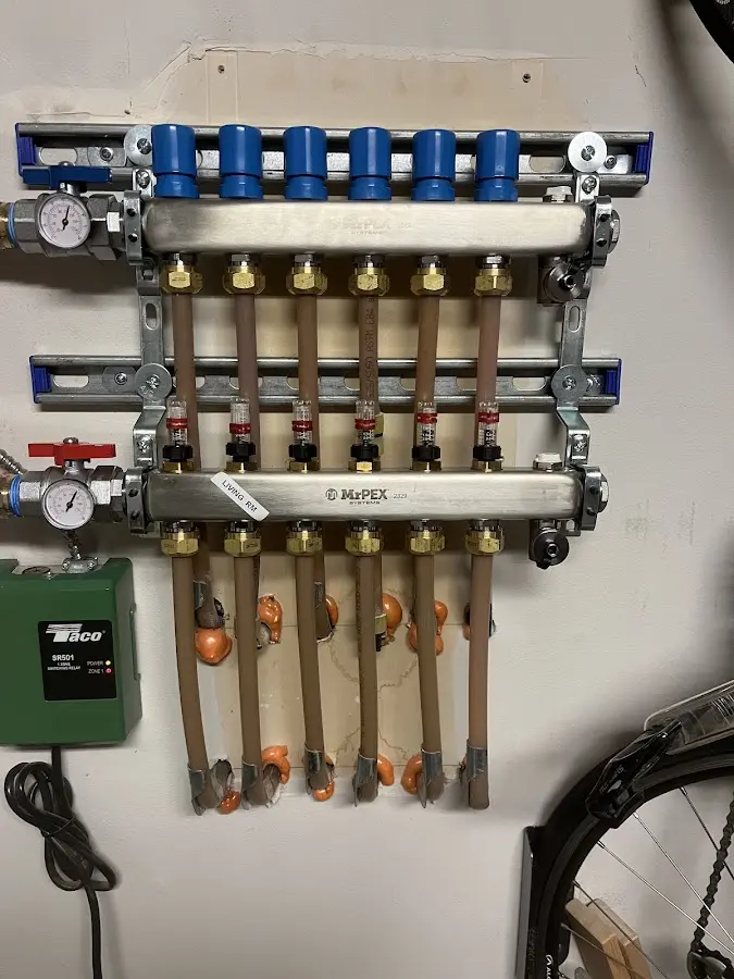 Plumber performing Water Heater Repair at a residential property in Scissors